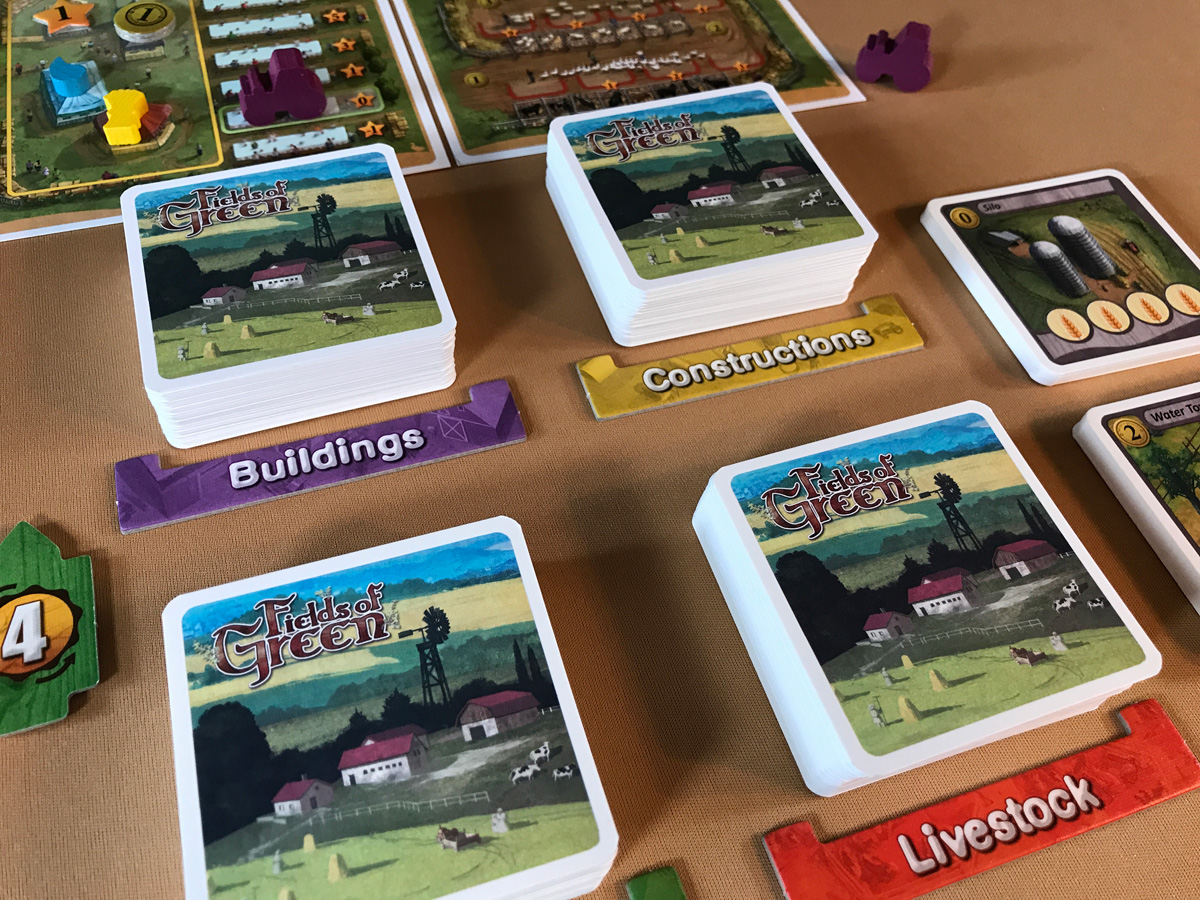 Fields of Green Different Piles of Cards So Many Different Possibilities to Build in Fields of Green