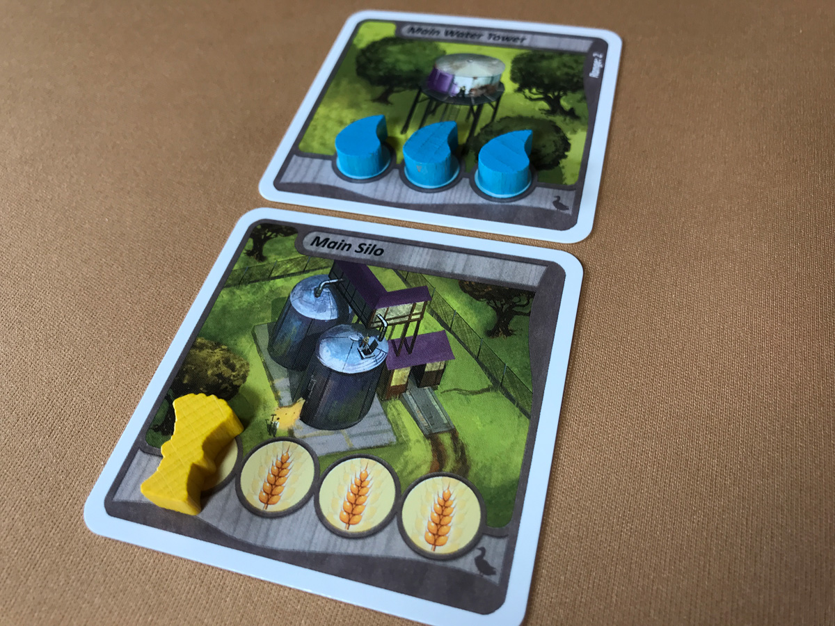 Fields of Green Small Starting Farm From Small Beginnings with a Silo and Water Tower in Fields of Green