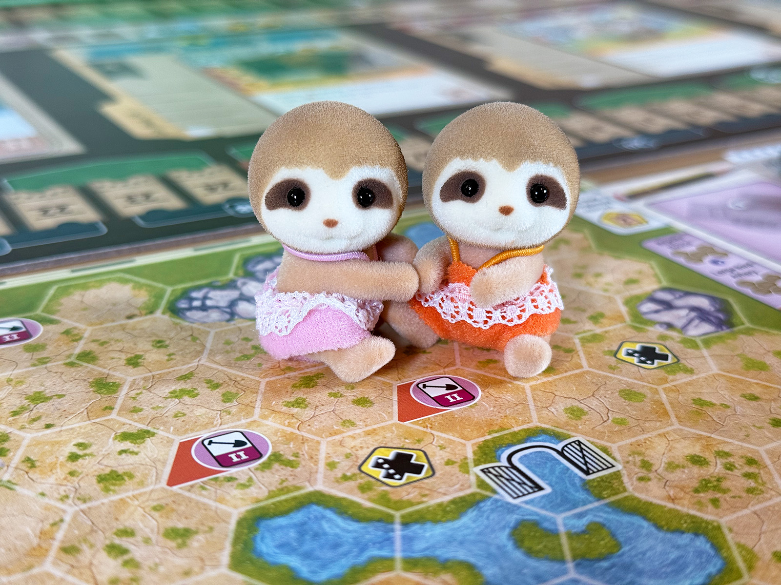 Ark Nova Hopeful Sloths of the Calico Critters Sort A Pair of Adorable Calico Critter Sloths Ready to Jump Into Ark Nova